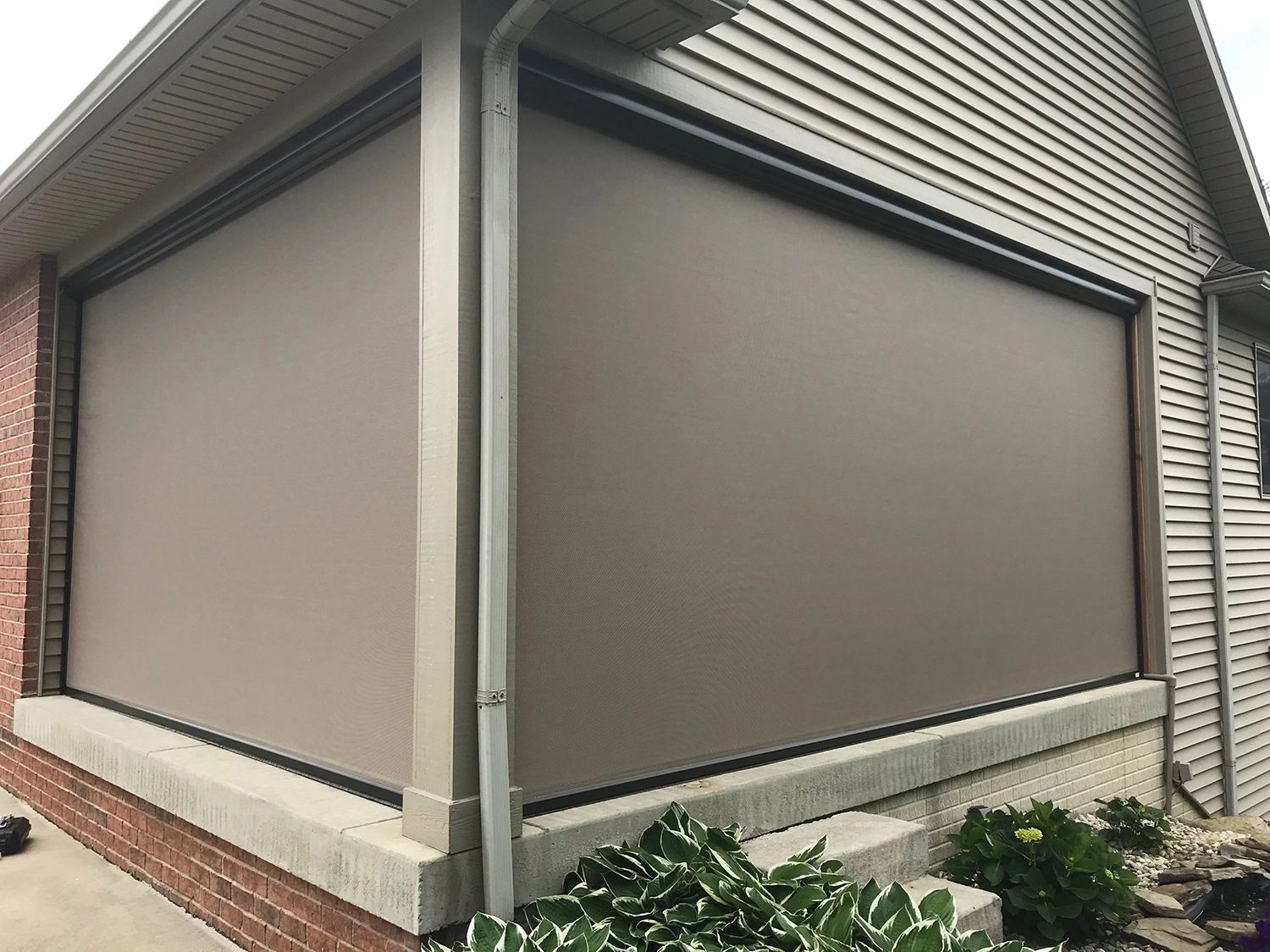 motorized retractable screen taupe fabric home exterior
