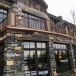 Copper Half Round Gutter on a stone house