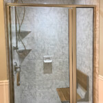 An accessible glass-enclosed shower