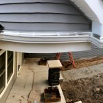House under construction with seamless gutters
