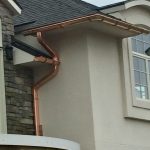 House with copper half round seamless gutters