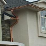 House with copper half round seamless gutters