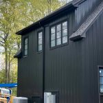 Building under construction with seamless gutters