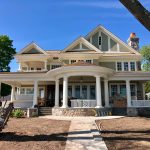 House under construction with seamless half-round gutters