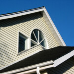 Roof with Seamless Gutters and Gutter Helmets