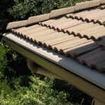 Tile Roof with Seamless Gutters and Gutter Helmets